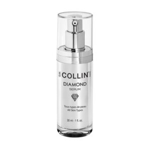 A bottle of collin diamond serum on top of a white table.